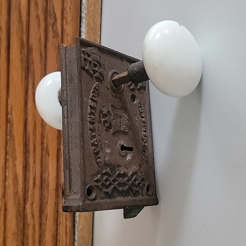 ANTIQUE PATENT 1863 IRON DOOR CASING WHITE KNOBS